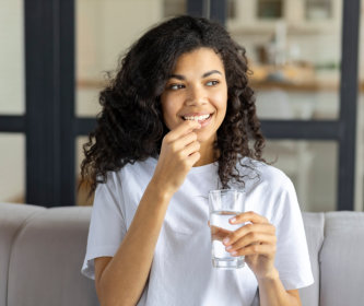 woman taking medicine