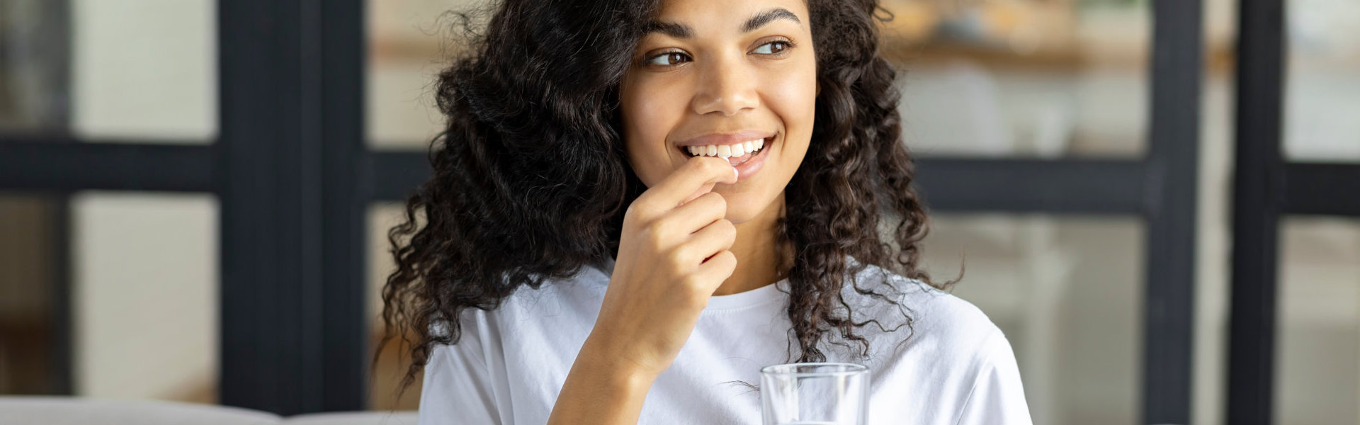 woman taking medicine