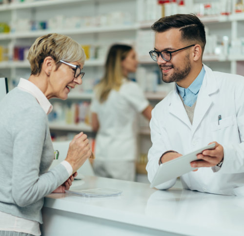 male pharmacist smiling